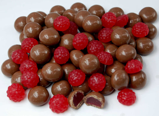 “Close-up of milk chocolate-coated raspberry lollies with chewy raspberry centres, displayed on a clean white background for a candy store product image.”