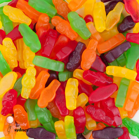 “Close-up image of colourful jelly baby lollies in assorted bright colours like red, orange, yellow, green, and purple, coated with a light sugary finish.”