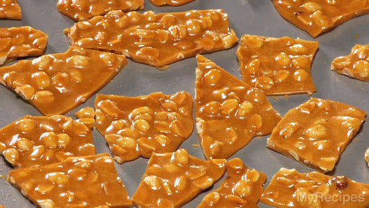 close up image of delicious cut up peanut brittle