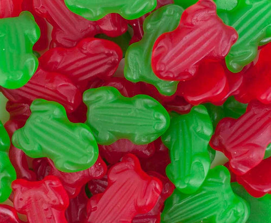 Red and green gummy frog-shaped lollies displayed on a white background, showing their soft, chewy texture and glossy finish.