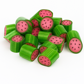 “Close-up of bright green and pink watermelon rock candies with black seed details, showing glossy surfaces and striped outer layers in a vibrant pile.”